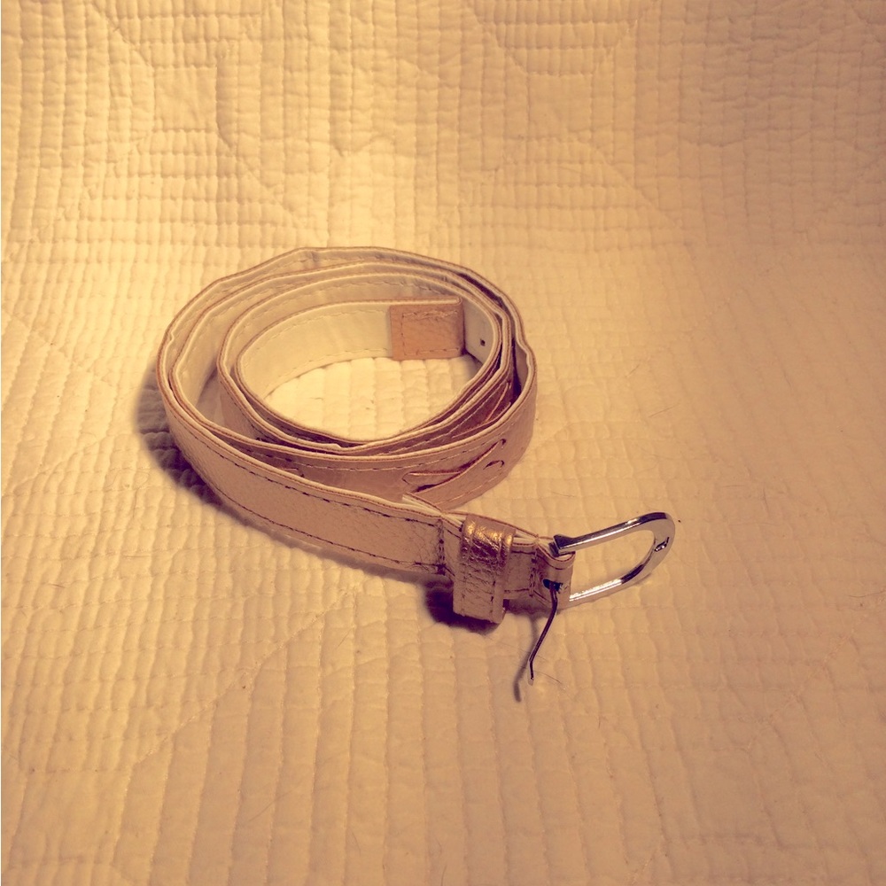 BELT Measures 38 1/4” from buckle end to tip 3/4” wide